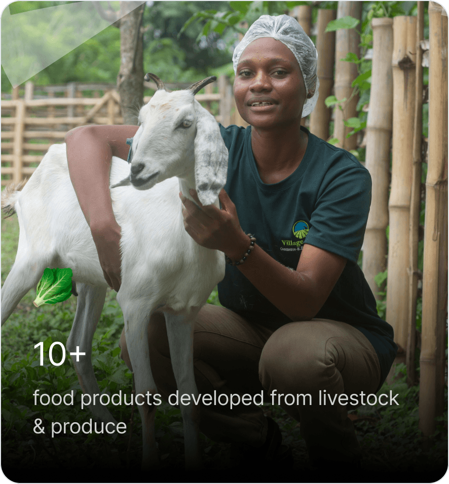 woman holding a goat